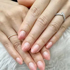 Who says natural nails can’t shine? This beautiful set features a sheer blush pink base with a subtle glitter ombré, proving that simple can still be stunning.