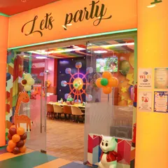 The entrance to our private party area, clearly marked with "Let's party". This dedicated space ensures your celebration feels exclusive and special.
