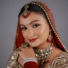 Another brilliant execution of a classic red bridal look by one of my students. I am incredibly proud of the professional quality of their work.