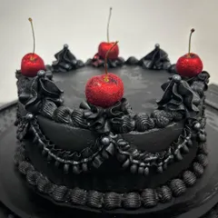 I had so much fun making this retro and gothic cake for a friend. The black-on-black piping with pops of red from the glitter cherries creates a cool, moody vibe. I'd love to make one of these for my own birthday.
