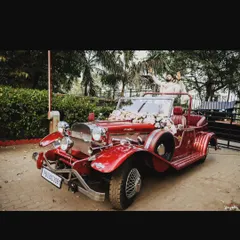 The groom making a grand entrance in a vintage car. I love helping couples plan unique and personalized moments like this that reflect their style and make their day extra special.