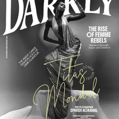 Seeing my work on the cover of Darkly Art Magazine was a defining moment. This project was about capturing the spirit of a "femme rebel" through dramatic posing, a liquid-metal gown, and a makeup look that is both powerful and graceful.