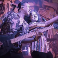At the heart of our band is the chemistry between us, Dhruvi and Johaan. This candid moment from a live show captures the joy and passion we bring to every single performance, feeding off each other's energy to light up the stage.