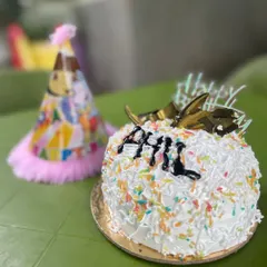 A party isn't complete without a cake and a hat. We pay attention to the little details that make a pet's birthday feel extra special. Just look at this delicious, pet-friendly cake ready for the birthday boy.