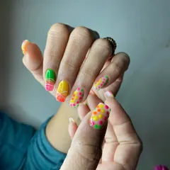Another angle of the colorful neon polka dot and gradient nails, showcasing the fun and creative possibilities of nail art.
