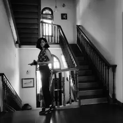 This black and white shot captures a more artistic and editorial side of my modeling. I love playing with light, shadow, and architecture to create a specific mood, making it perfect for more stylized brand campaigns or lookbooks.