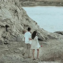 Walking away together into the rugged landscape, this shot symbolizes the start of a shared journey. It’s a candid moment that feels both hopeful and adventurous.