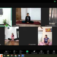 A glimpse into our online Women's Day workshop, where participants are guided through yoga for hormonal balance. This shows how we address specific health concerns like PCOS and PCOD with targeted practices in an accessible online format.
