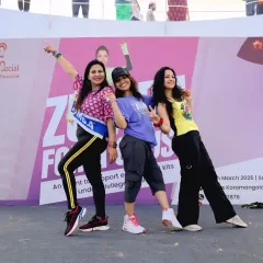 Posing with fellow instructors at our 'Zumba for a Cause' charity event. We unite to support the education of underprivileged children through dance. It's fitness with a purpose.