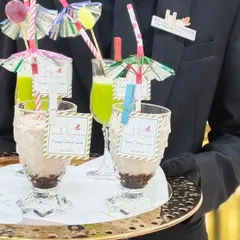 Welcome your guests with refreshing mocktails and juices. My staff serves these beautifully presented drinks, each tagged with my brand, as a perfect start to the celebration.