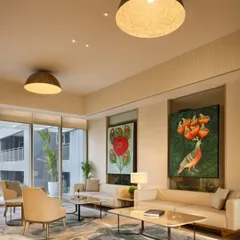 In this lounge at Godrej Woods, I used art as a central narrative element to create a sophisticated yet comfortable atmosphere. The space is designed for quiet conversation and relaxation, with natural light, soft textures, and curated furniture that encourages residents to pause and connect.