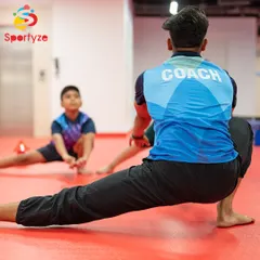 The journey from little leaps to big dreams starts with a coach's support. We believe in teaching by example, stretching and training alongside our students.
