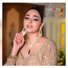 A close-up of our Moissanite Polki collection, where traditional craftsmanship meets modern design. Notice the rich green emerald drop that adds a pop of colour to the intricate Polki work. This set is perfect for a Sangeet or reception, giving you a regal look with a contemporary feel.