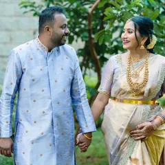 A maternity portrait doesn't always have to be posed. This candid moment of a couple sharing a look during a walk shows the beautiful, quiet connection of expecting parents. I love capturing these simple, real emotions in traditional attire.