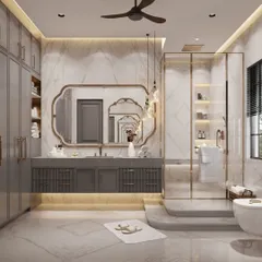 A bathroom with a classical touch, featuring an ornate mirror and elegant grey cabinetry. The raised shower platform and under-vanity lighting add layers of dimension and sophistication to the design.