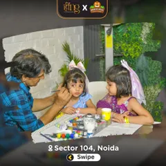 A young guest gets her face painted during a Barbie-themed party. Face painting is a creative and fun activity that lets kids transform into their favorite characters.