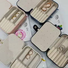 These portable jewelry organizer boxes are a simple and incredibly useful gift. I often include them in my hampers for her, as they are perfect for keeping small accessories safe while traveling.