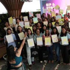The team from Meesho proudly holding up their finished texture paintings. It was an amazing experience to see so many people, most of whom had never painted before, create such beautiful and personal artworks.