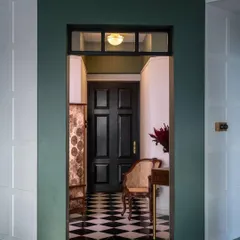 The entryway of our 'Inde Blue' project in Mumbai. The design is a quiet conversation between light and shadow, material and memory. It was imagined not as a showpiece, but as a feeling, a slow, soulful space where the air feels softer.