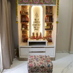 A full view of the pooja unit, showing the ample shelving for deities and the elegant design that makes it a divine focal point in the home.
