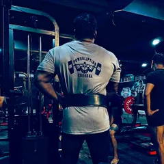 Wearing my Powerlifting Khordha shirt with pride. This back shot shows the foundation of strength built from years of heavy lifting.