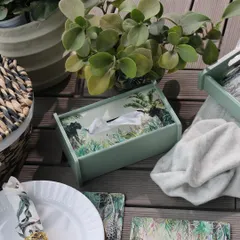 A close-up of our Savanna tissue box, styled on an outdoor deck. This piece shows how even the most practical items can be elevated with beautiful design, contributing to a cohesive decor theme.