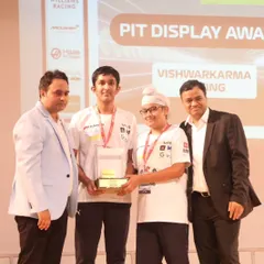 Our mentored team, Vishwakarma Racing, receiving the Best Pit Display Award at the F1 in Schools India Nationals. We are proud to guide the next generation of engineers and designers.
