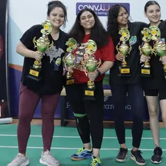 Celebrating the winners of the women's category at the Pernod Ricard India tournament. I ensure our events have diverse categories, including singles, doubles, and mixed doubles, so every employee gets a chance to compete and shine.