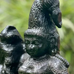 This is Madurai Meenakshi, the "fish-eyed one," hand-carved from black granite by talented artists from Tamil Nadu.