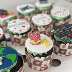 Another look at the variety in a custom cupcake box. I can create toppers for any theme, including TV shows, cars, and personal messages.