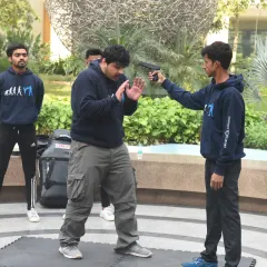 Facing a gun is a worst-case scenario, and we train for it. My technique focuses on one thing: survival. I teach you how to redirect the line of fire, control the weapon, and neutralize the threat with decisive action. This is not a movie scene; it's a critical survival skill.
