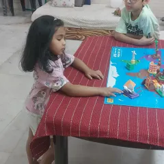 A glimpse into our 'Wonders of the World' workshop. Here, children are using a map and models to learn about geography and famous landmarks in a hands-on way.