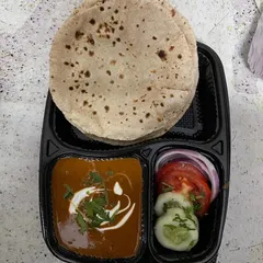 This is my classic home-style tiffin, featuring soft rotis made from fresh chakki atta, served with a comforting dal, and a side of fresh salad. It's the perfect simple and satisfying vegetarian lunch or dinner.