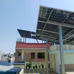 Another angle of the 10 KW residential project in Pashchim Vihar. The high elevated structure allows for unobstructed sunlight capture throughout the day, which is key for an efficient On-Grid solar system.