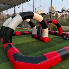 Our inflatable go-kart track is a major attraction for any kids' party. I set up the entire circuit, complete with arches, providing a safe and exciting racing experience for young drivers.