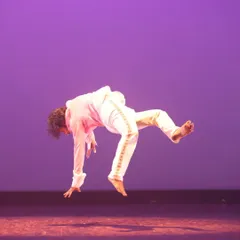 This is the athleticism and artistry of contemporary dance. This shot from our student showcase captures a moment of weightless suspension, demonstrating the strength and control we build in our advanced training programs.