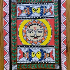 A beautiful Madhubani painting by a student, featuring the sun and fish motifs which symbolize energy, prosperity, and harmony. The piece is a wonderful blend of intricate patterns and bright colors.