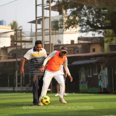 A moment of friendly competition between two dads during a parent match. Our sessions encourage everyone to get involved, stay active, and enjoy the game.