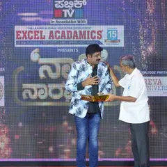 Receiving a felicitation from Ranganna sir at a Public TV event for Excel Acadamics. I am thankful to the organizers for this honor.