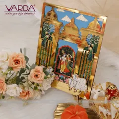 A beautiful Radha Krishna themed wedding invitation featuring a 3D pop-up within a golden archway. The design, inspired by traditional Indian art, captures the divine romance of Radha and Krishna, making it a perfect start to your wedding story.
