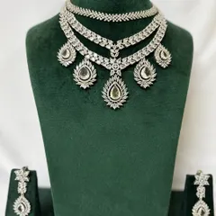 A full view of a layered American diamond necklace set. This rental piece is designed to create a glamorous look for any modern event.