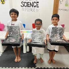 Our team of junior scientists proudly presenting the solar cookers they built in class. They learned about insulation, reflection, and greenhouse effects, all while making a useful and eco-friendly project.