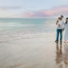 A candid shot of the family walking along the shoreline. I enhanced the sky to create this dreamy, picturesque final image.