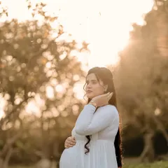 There's nothing like the glow of a mother-to-be in the golden hour sun. This is a classic, timeless outdoor portrait that focuses purely on you and your bump in the most beautiful natural light.