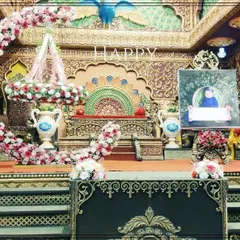 Another view of the magnificent palace-themed naming ceremony stage. The detailed architecture and floral arrangements create a regal atmosphere perfect for such a special occasion.