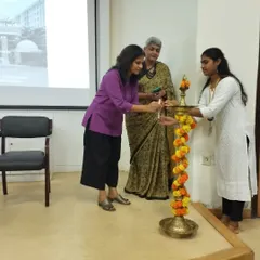 The ceremonial lighting of the lamp to inaugurate the Reva Rachna exhibition. These traditions are a meaningful start to a day of sharing and celebrating the hard work of students.