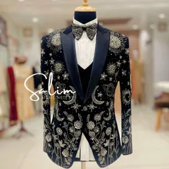 This is one of my most detailed creations, a celestial-themed tuxedo jacket. It features hand-embroidered planets, stars, and moons on rich black velvet, designed for a truly astronomical impact at any black-tie event.