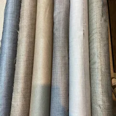 A selection of pure woollen fabrics, ideal for crafting warm and structured suits and blazers that hold their shape beautifully.