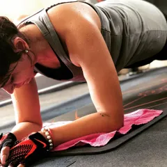 The plank is a powerhouse for core strength. This close-up shot captures the focus and determination it takes to hold proper form and engage the right muscles.