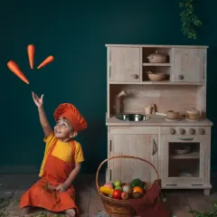 A themed birthday shoot for my son's fifth birthday, celebrating his love for books and cooking. Themed shoots are a wonderful way to capture your child's current passions and create a story around them.